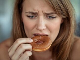 woman upset after her boyfriend called her fat