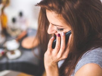 woman talking on phone about her relationship triangulation